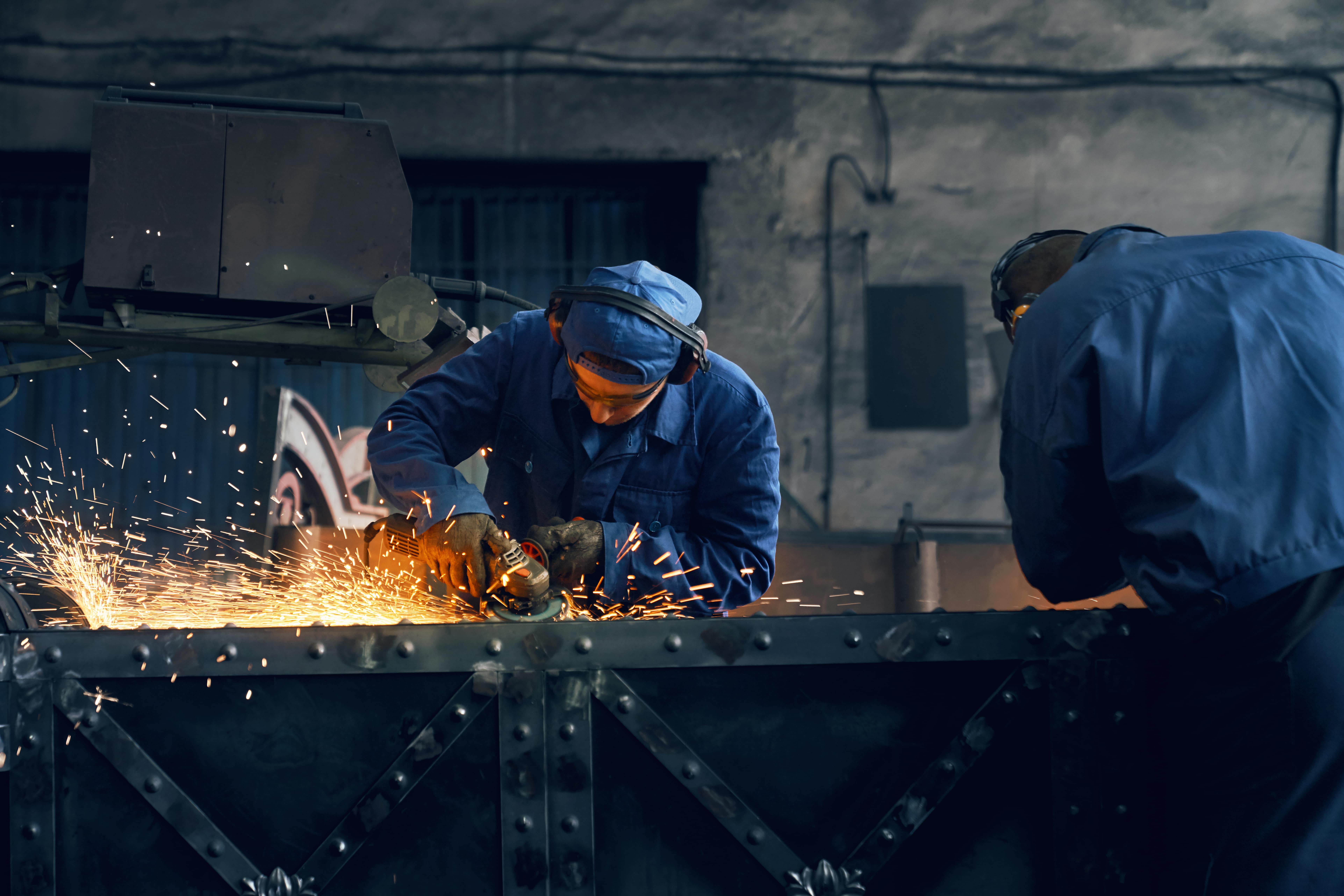 two-worker-making-gates-smithy (1)-min